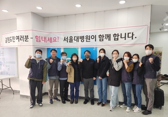 서울대병원- 분당서울대병원 의료봉사단 단체사진 ⓒ타임즈